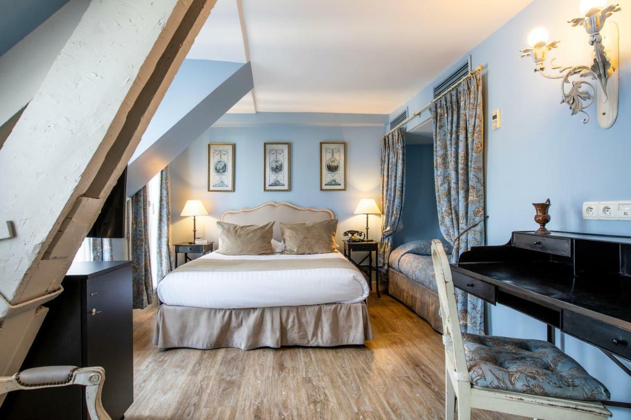 Hotel Des Ducs D'Anjou Paris Bagian luar foto
