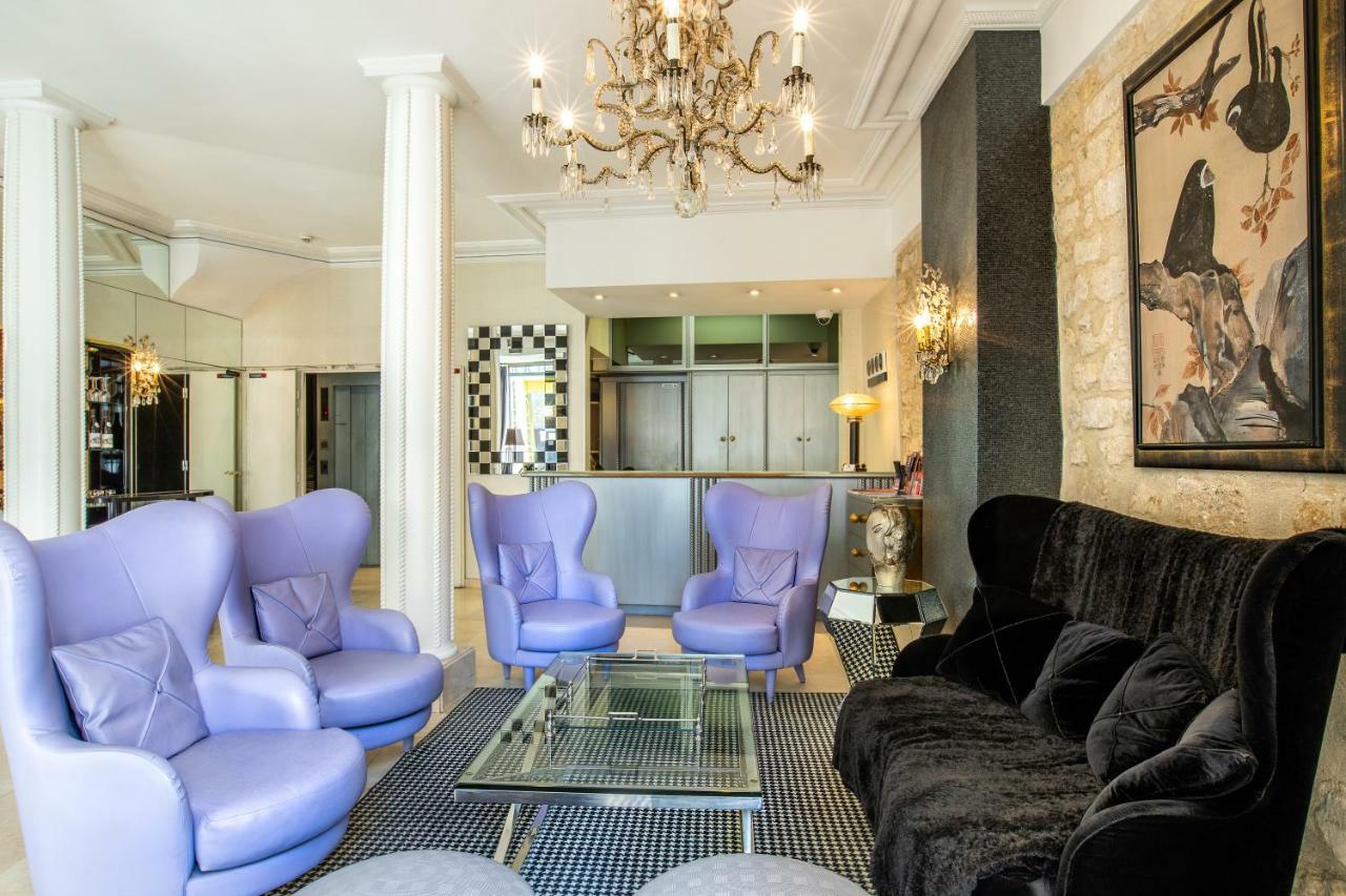 Hotel Des Ducs D'Anjou Paris Bagian luar foto